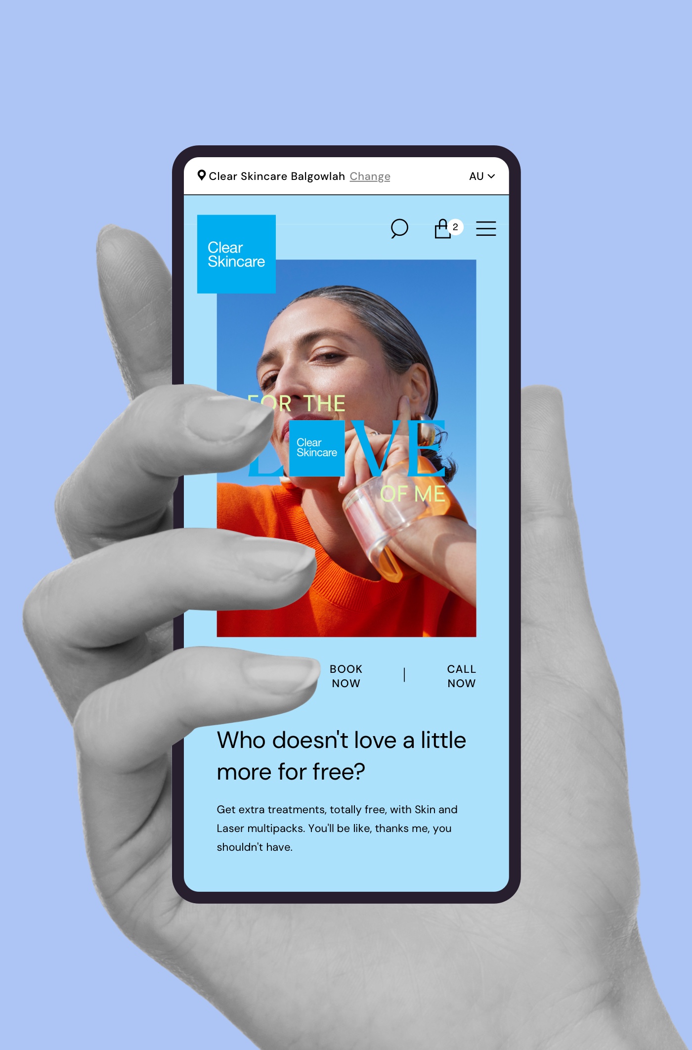 Hand holding a phone displaying Clear Skincare ad